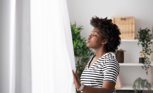 woman taking a deep breathe