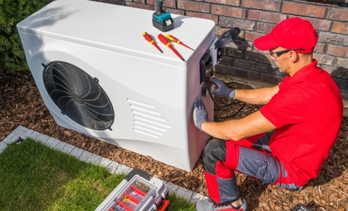man working on HVAC unit